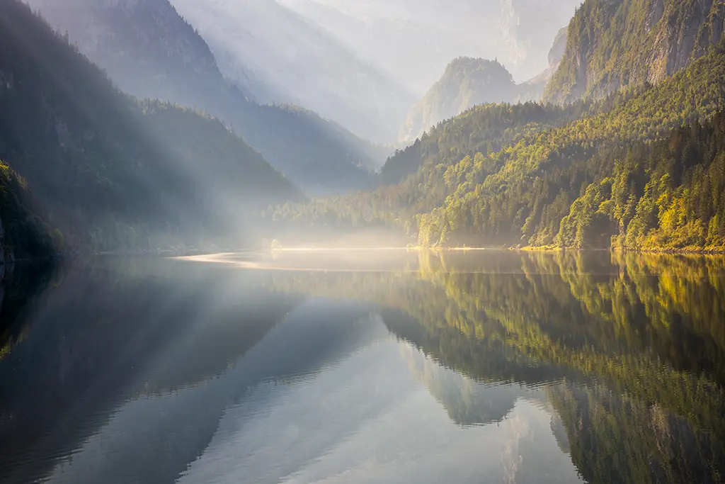 Light and fog - landscape photo by Tom Monochrom